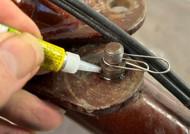 Securing the stud with crazy glue.