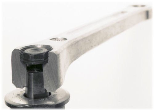 Once the dustcap has been removed, the fixing bolt (or nut) is exposed.