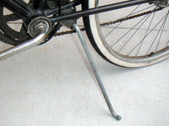 A kickstand whose pivot is welded to the frame.